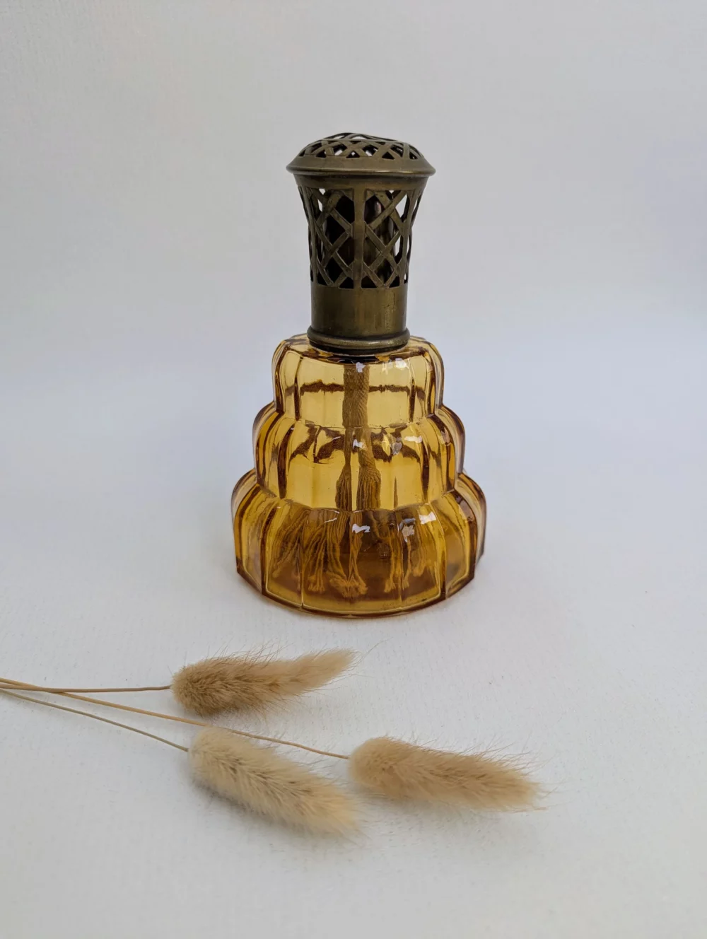 Antique shepherd's lamp in amber glass