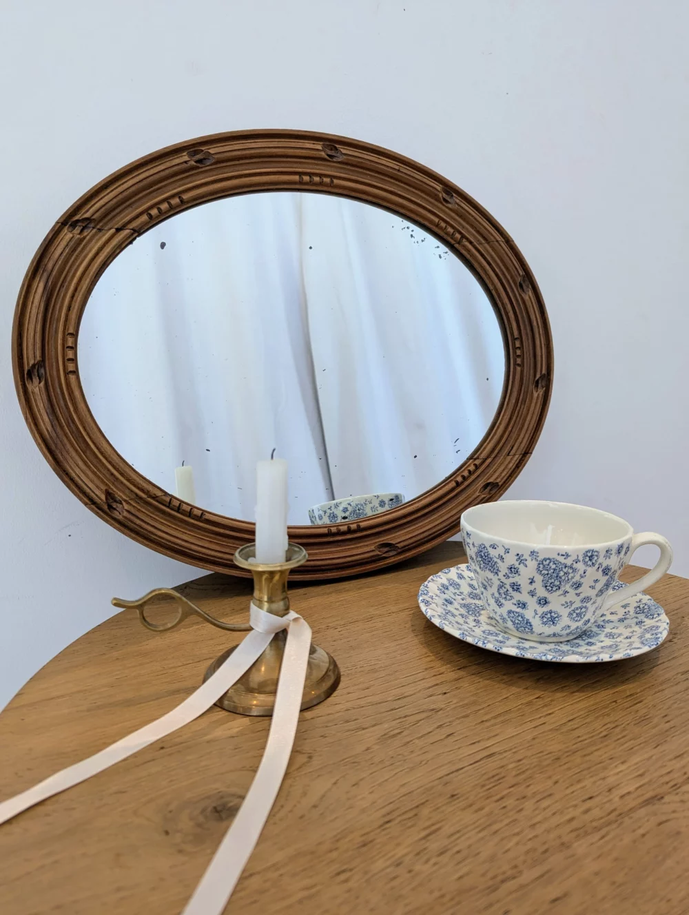 Ancien miroir en bois ovale